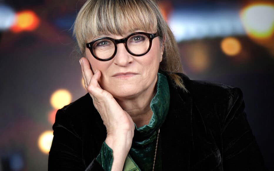 Christine Bravo souriante, &eacute;voquant sa carri&egrave;re