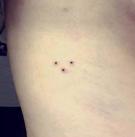Le tatouage en forme de triangle un symbole mystérieux