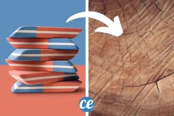 Gomme bleue effaçant un trait sur du bois