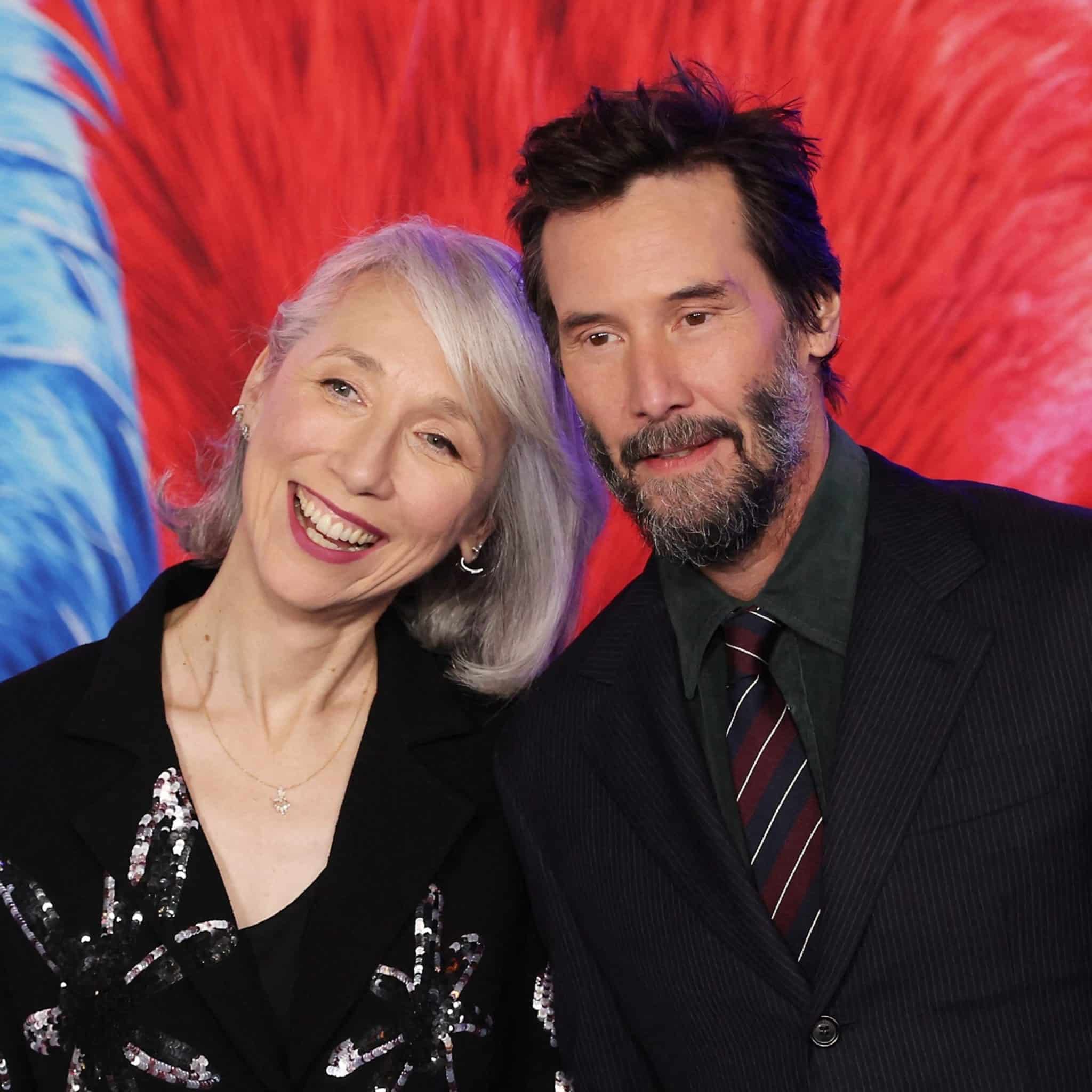 Le couple souriant et complice lors d'une soir&eacute;e officielle